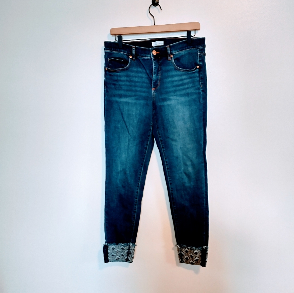 Loft skinny jeans dark wash with patterned hems at the ankle. Size 8